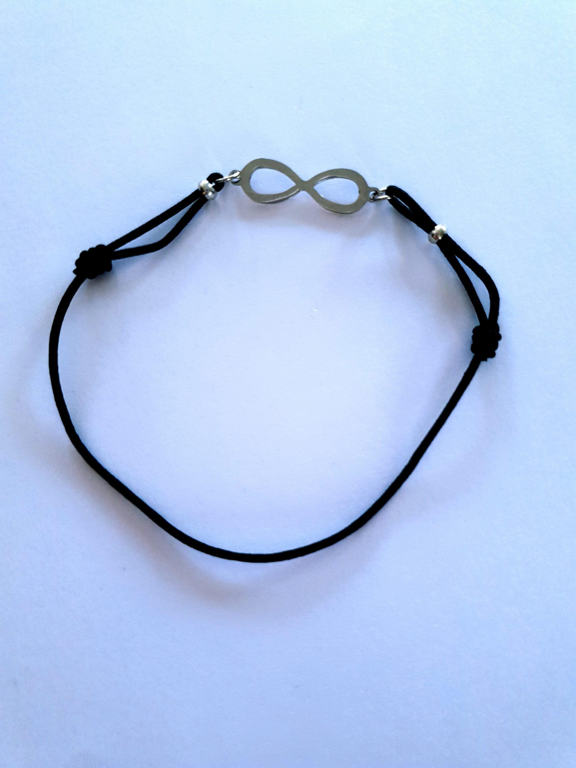Bracelet élastique noir Médaillon Infini Acier - UNBRINDERIEN